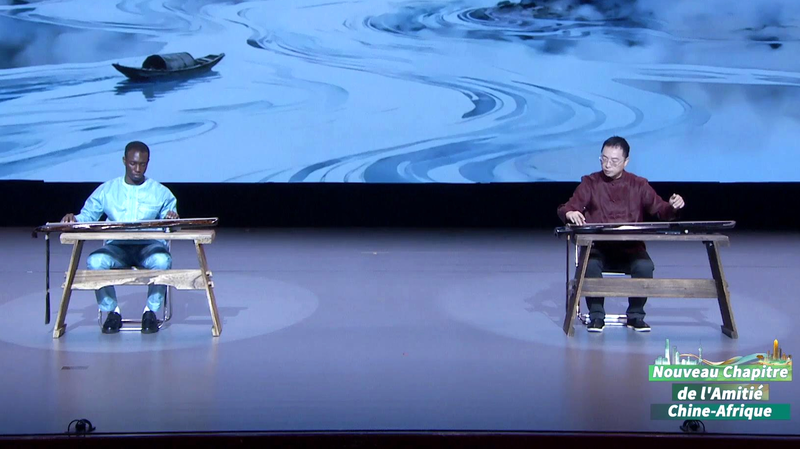 Guqin Gặp Gỡ Điệu Nhạc Togo: Một Sợi Dây Kết Nối Âm Nhạc video poster